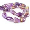 Natural Ametrine Faceted Tumble Beads Strand Length 13 Inches and Size 24-30mm approx. Ametrine, also known as trystine or by its trade name as bolivianite, is a naturally occurring variety of quartz. It is a mixture of amethyst and citrine with zones of purple and yellow or orange 